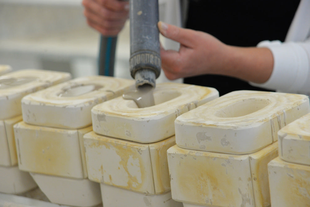 Foundry: slip is poured into plaster moulds for CWC ceramic sleeves, GMUNDNER Keramik in Gmunden