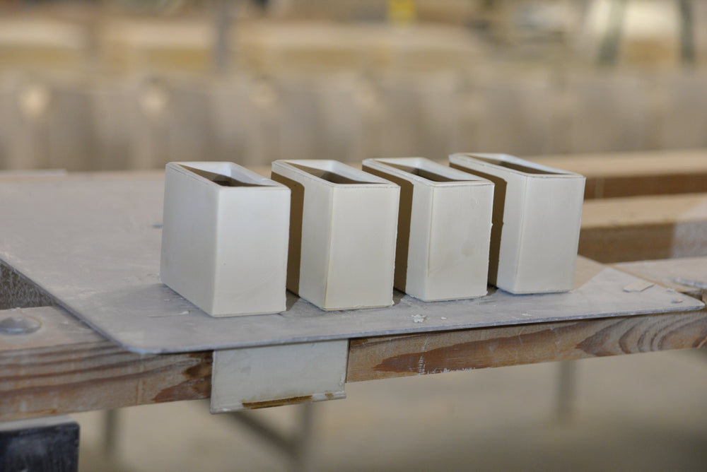 Unglazed raw pieces of the CWC ceramic sleeves at GMUNDNER Keramik in Gmunden